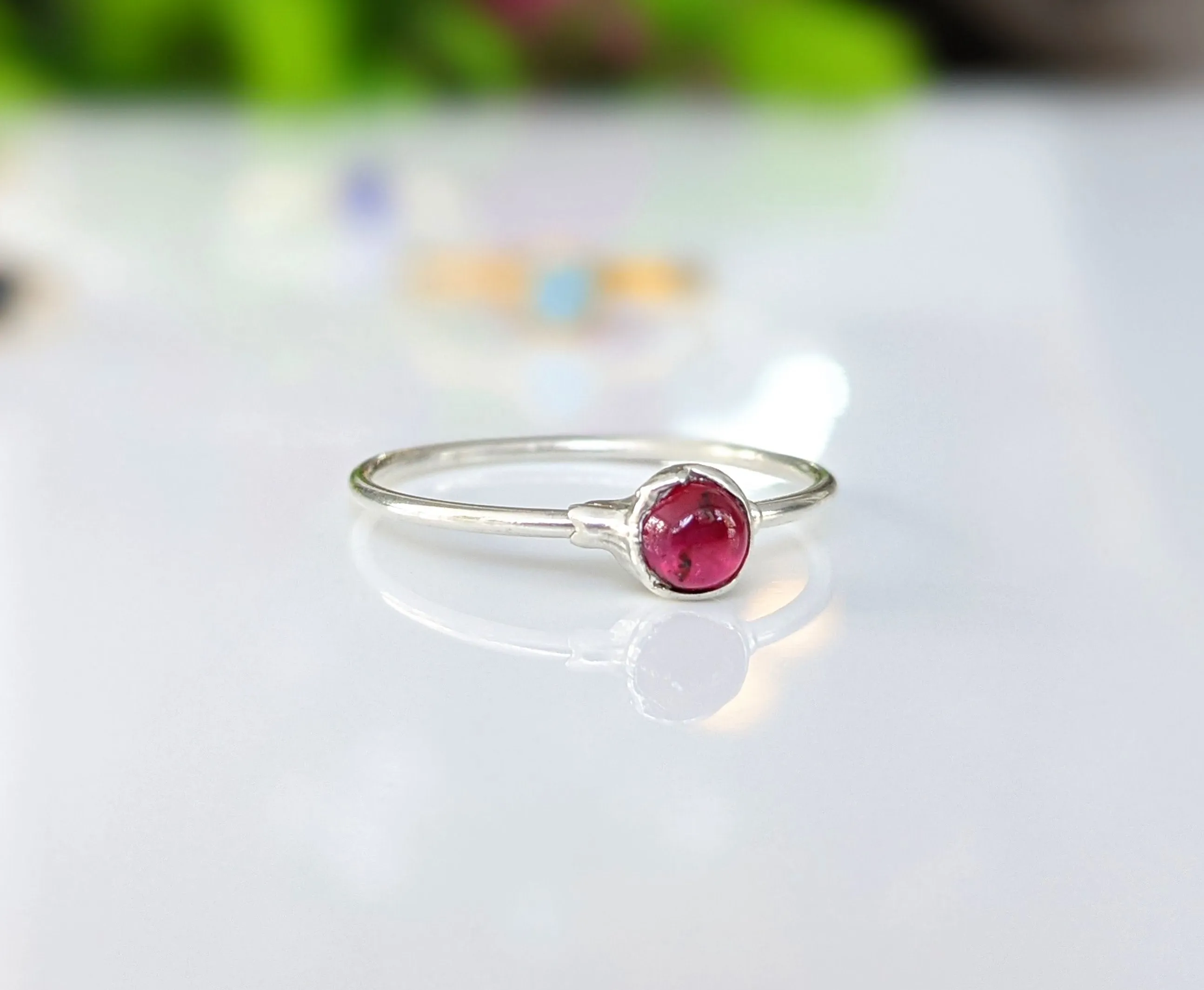 Dainty Ruby stacking ring in 18k Gold