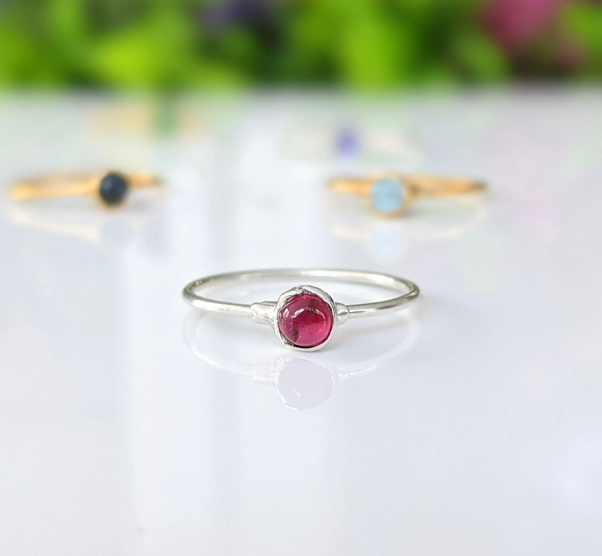 Dainty Ruby stacking ring in 18k Gold