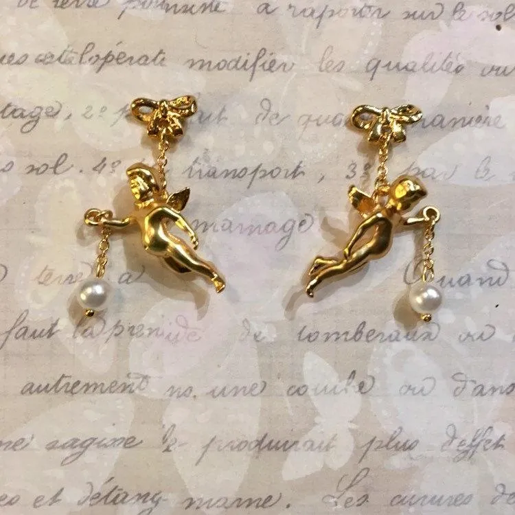 Flying cherub Pearl Earrings by Bill Skinner