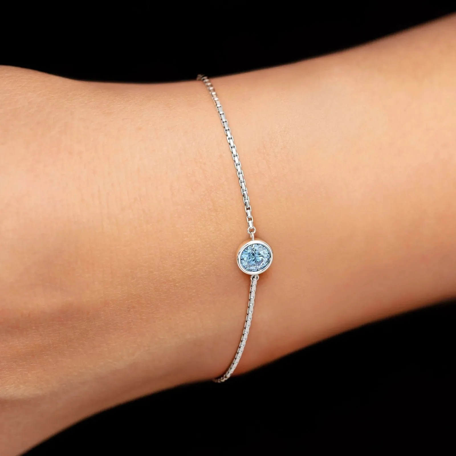 Irosk Bezel Set Round Sky Blue Topaz Bracelet