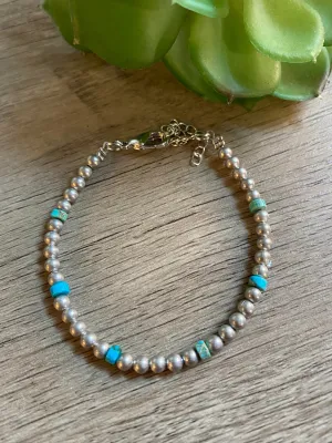 Little bit of blue bracelet with silver plated bead