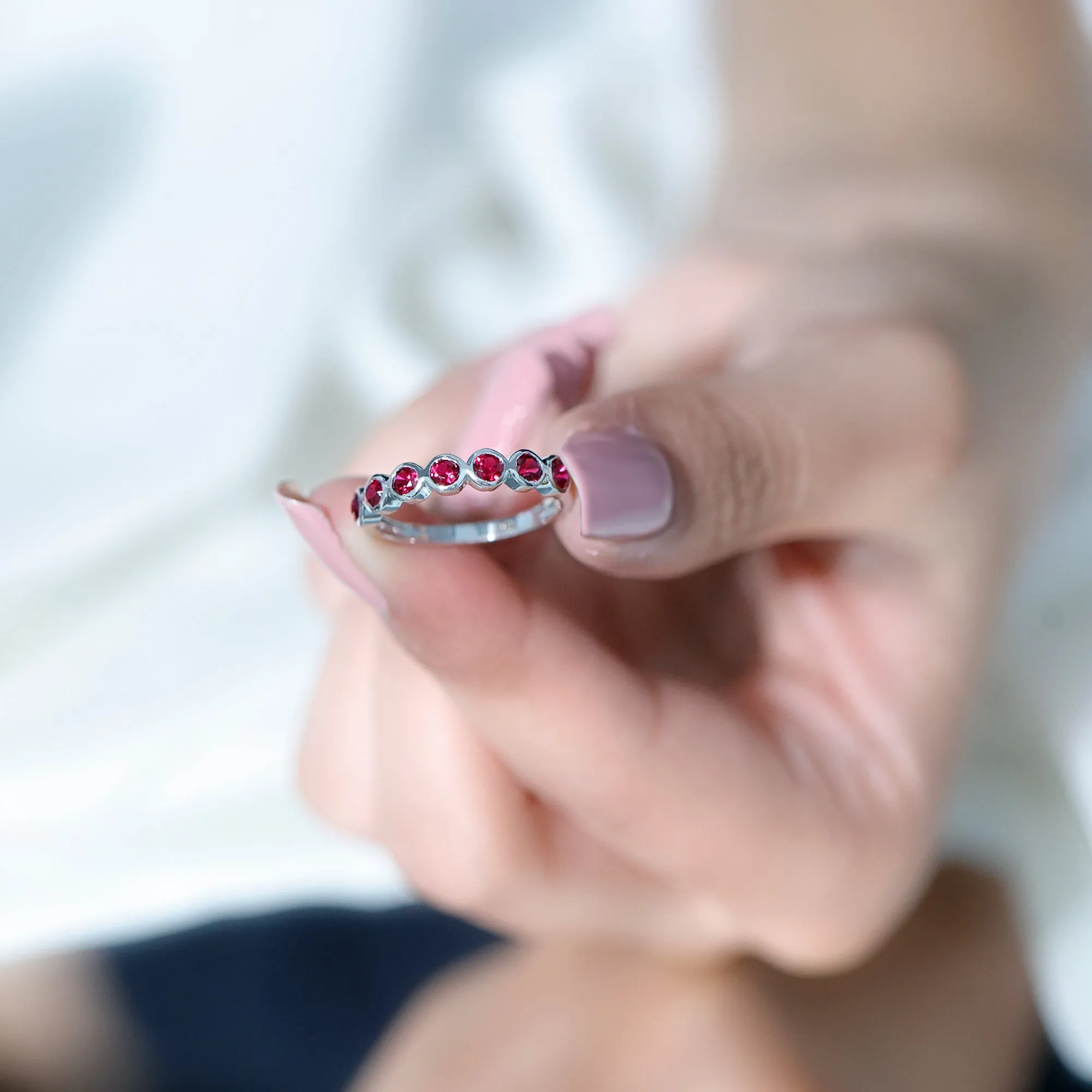 Minimal Created Ruby Half Eternity Ring in Bezel Setting