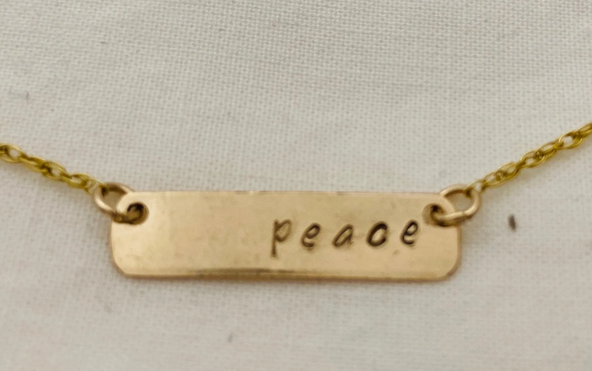 Peace Stamped Bar Pendant