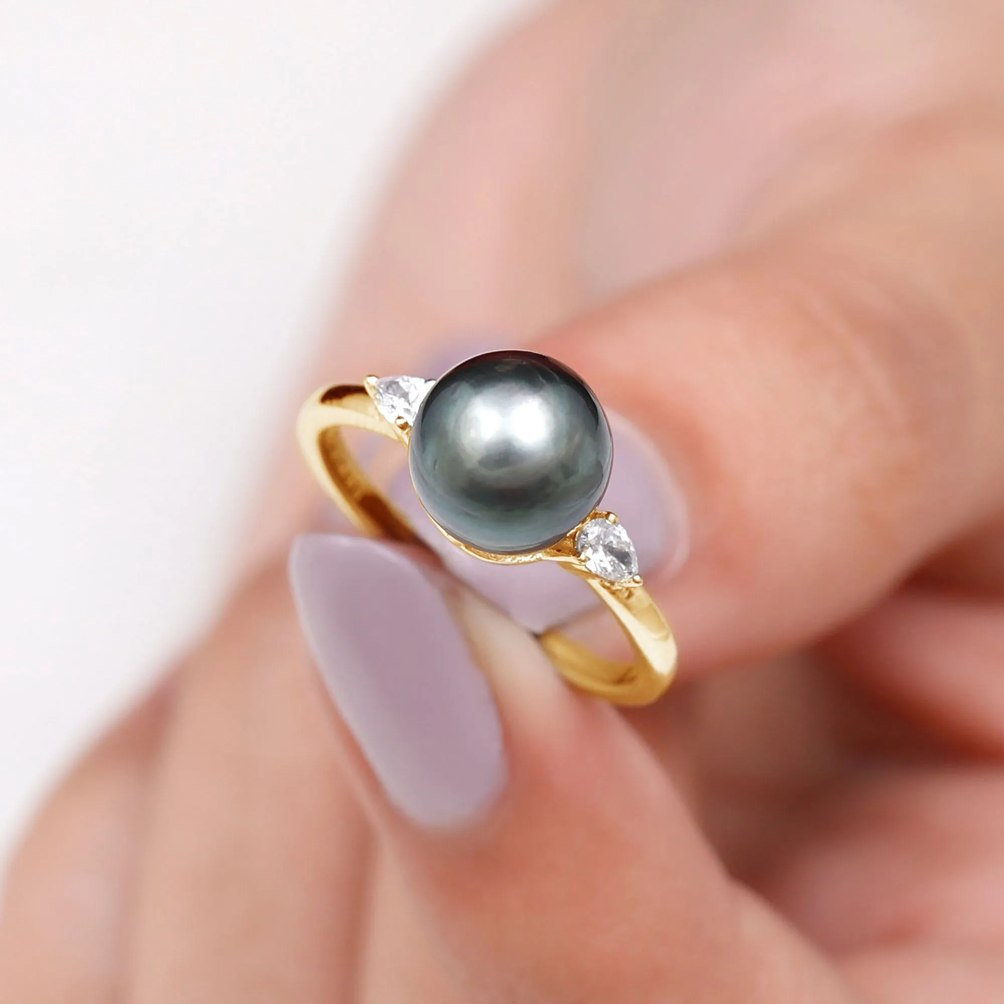 Round Tahitian Pearl Solitaire Ring with Pear Shape Moissanite