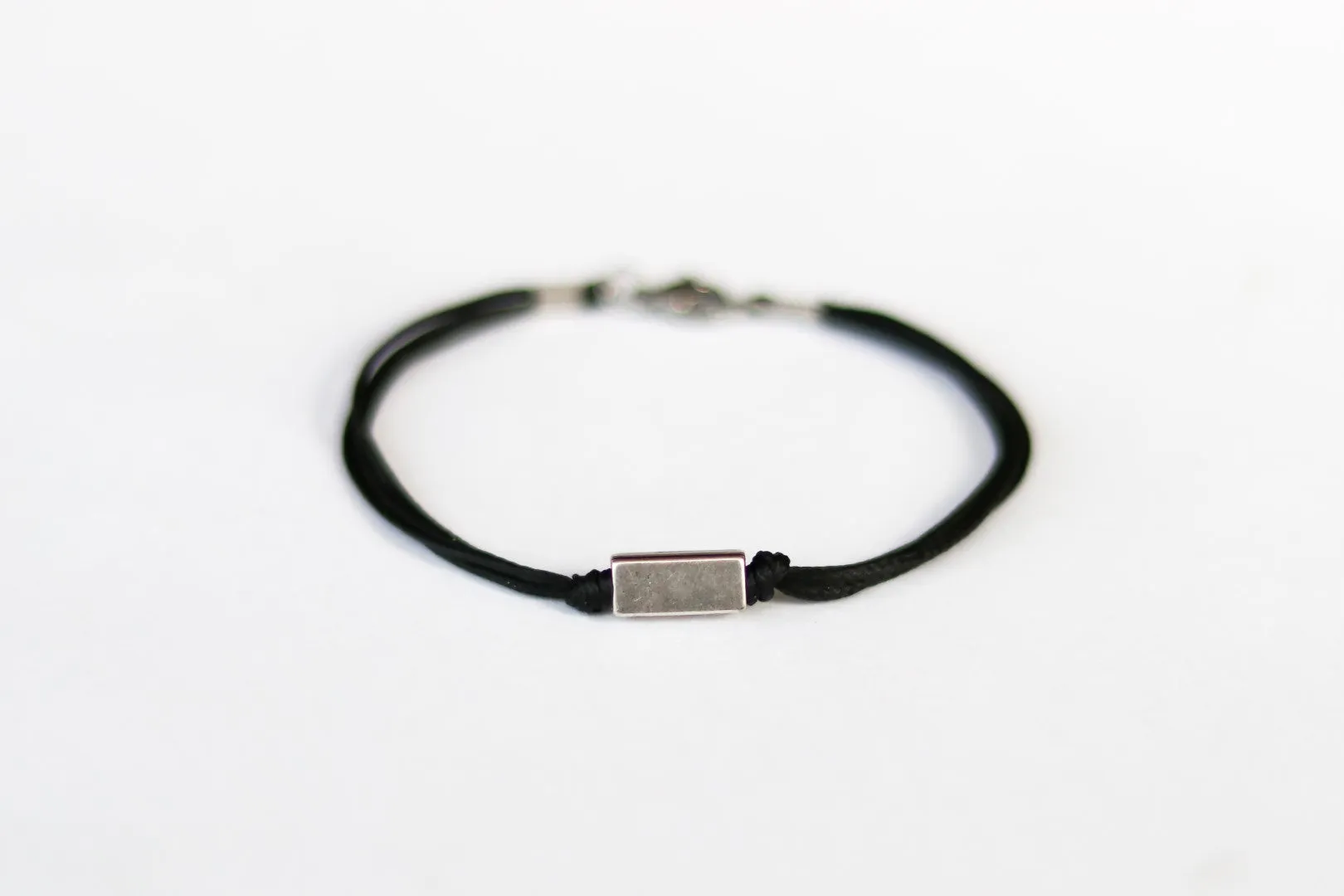 Silver bead bracelet for men, black cord, geometric jewelry