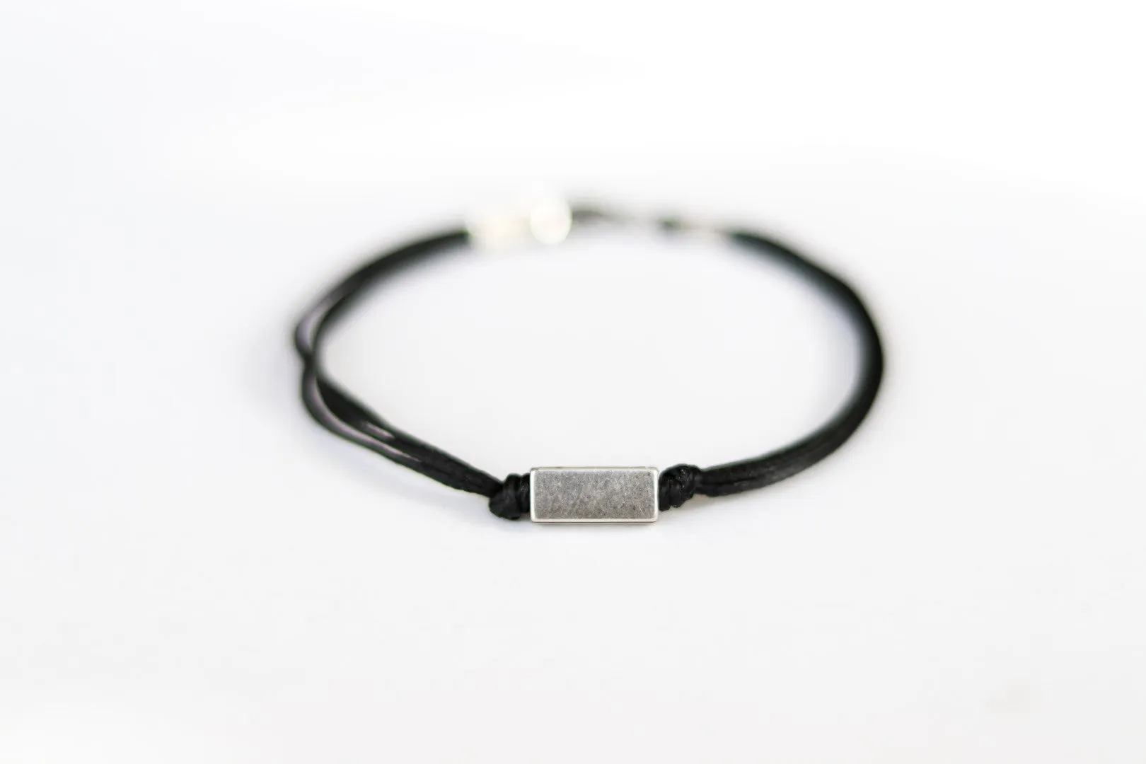 Silver bead bracelet for men, black cord, geometric jewelry