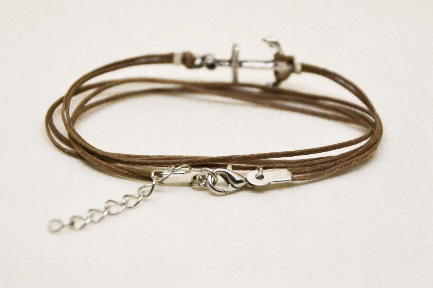 Silver charm anchor bracelet, wrapped brown cord, adjustable, gift wrapped festival jewelry