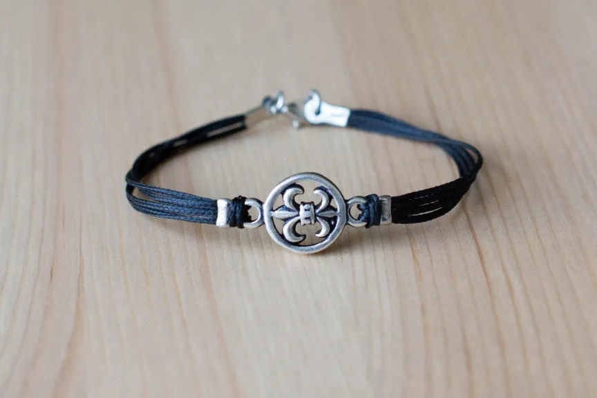 Silver Fleur de lis bracelet for men, black cord, lily flower charm