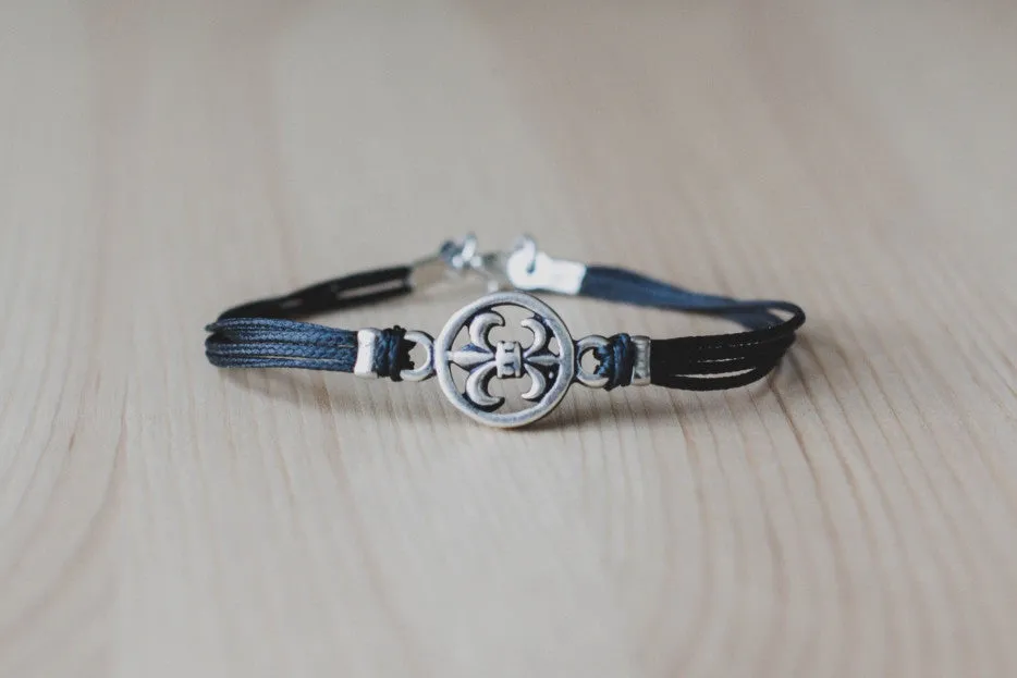 Silver Fleur de lis bracelet for men, black cord, lily flower charm