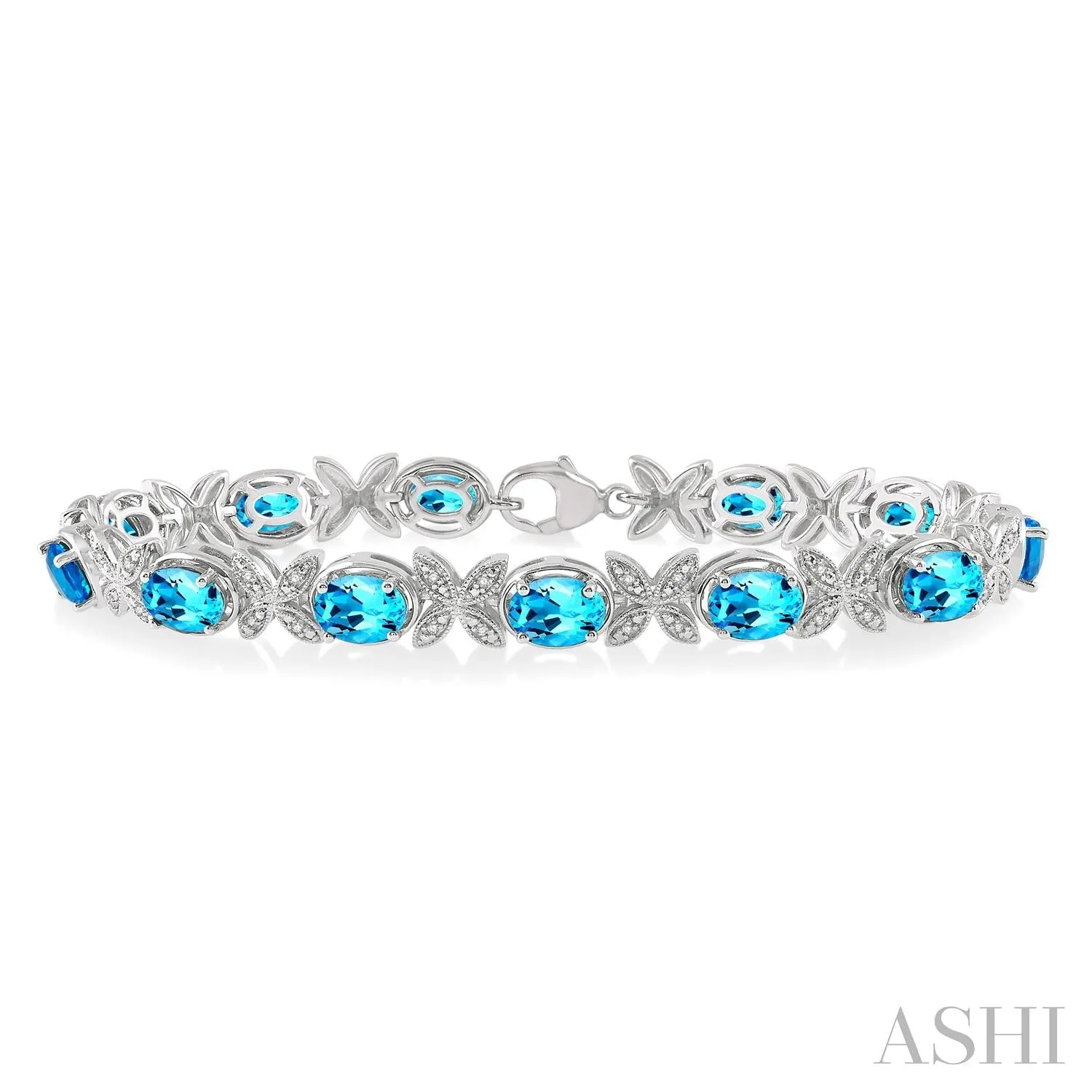 SS 0.10 CTW Round Cut Diamond and 7x5MM Oval Cut Blue Topaz Bracelet