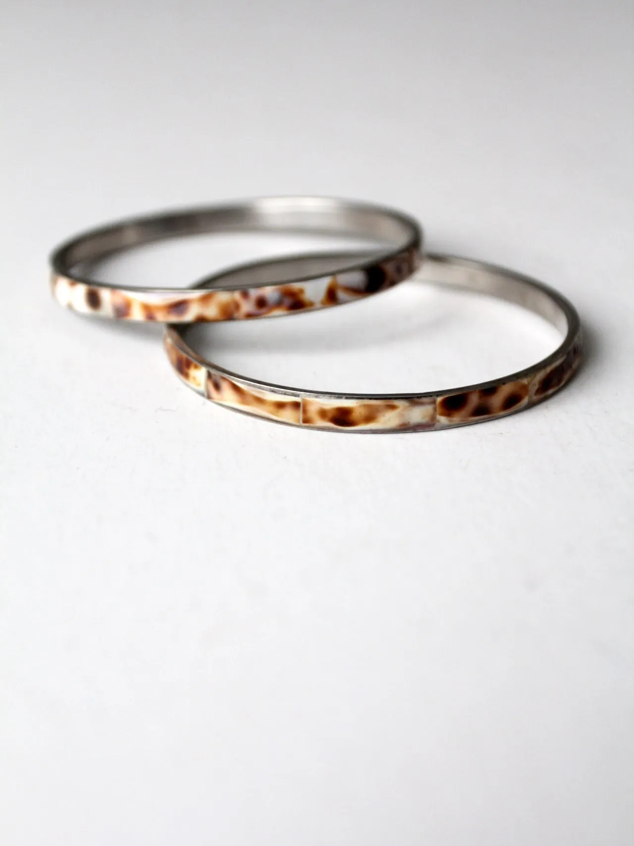 vintage speckled shell bangles pair